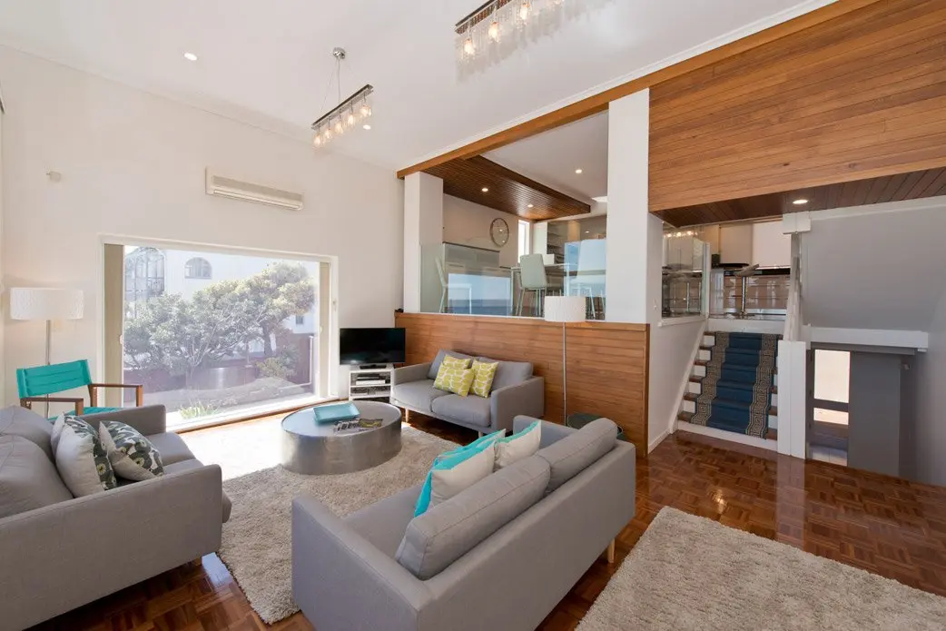 Inside of lounge area in rental hosted by Elite Accommodation